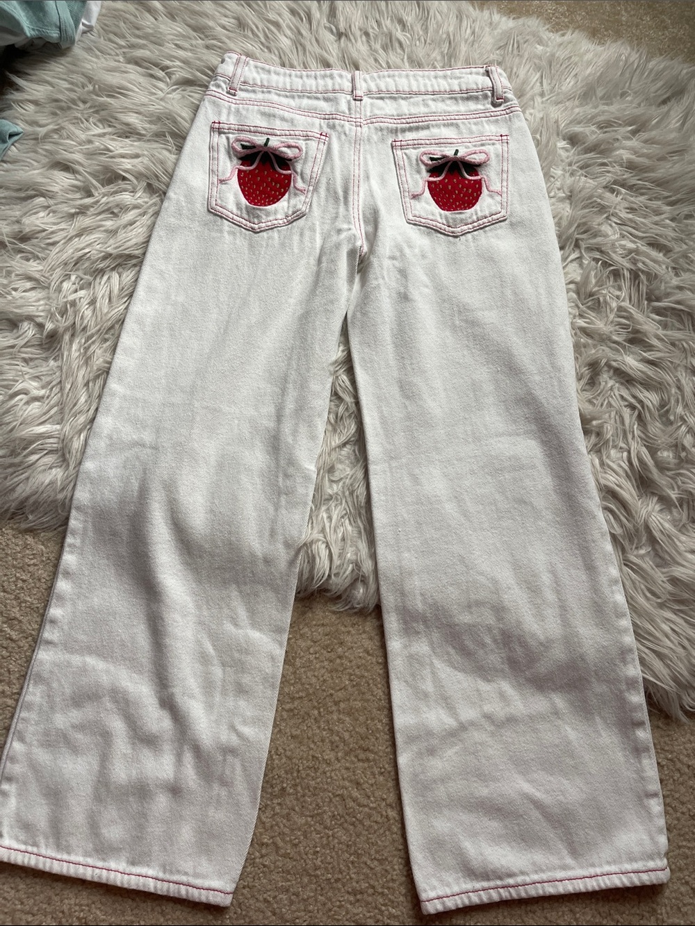 Edikted White Wide-Leg Jeans with Red Strawberry Pocket Appliqués